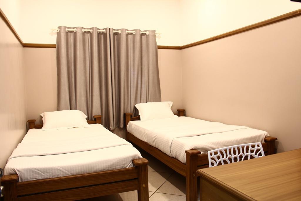 Icon Residency Hotell Kalpatta Rom bilde