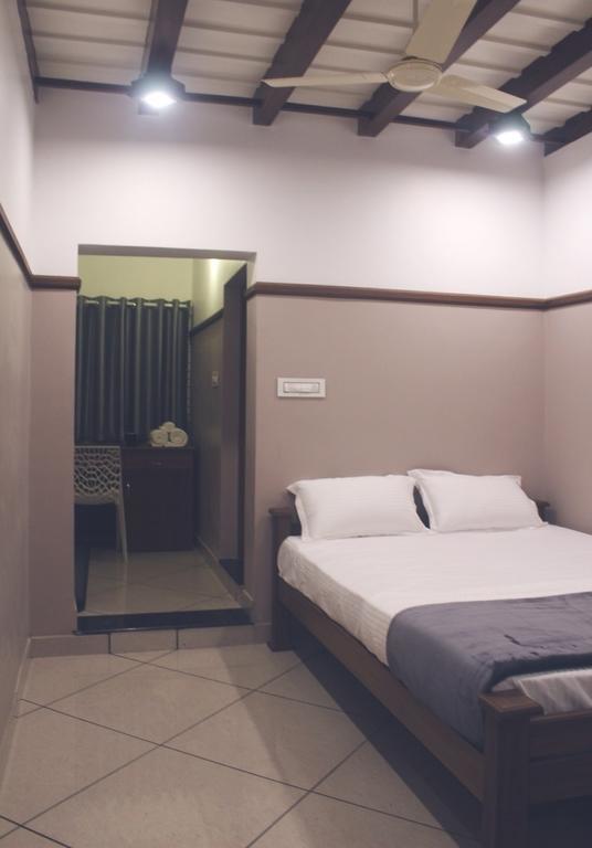 Icon Residency Hotell Kalpatta Rom bilde
